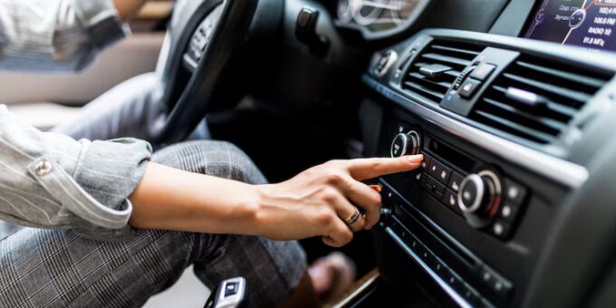 Car interior with upgraded speakers, subwoofer, and amplifier